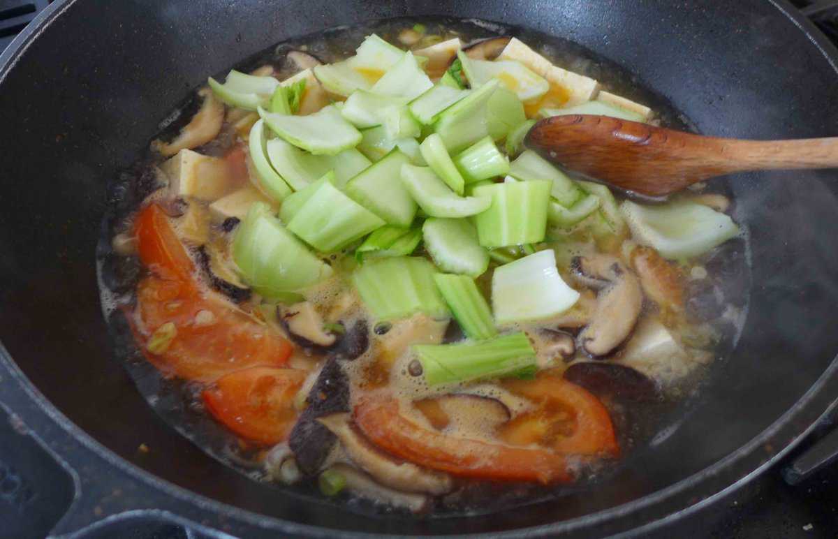 adding Bok Choy stems to soup.