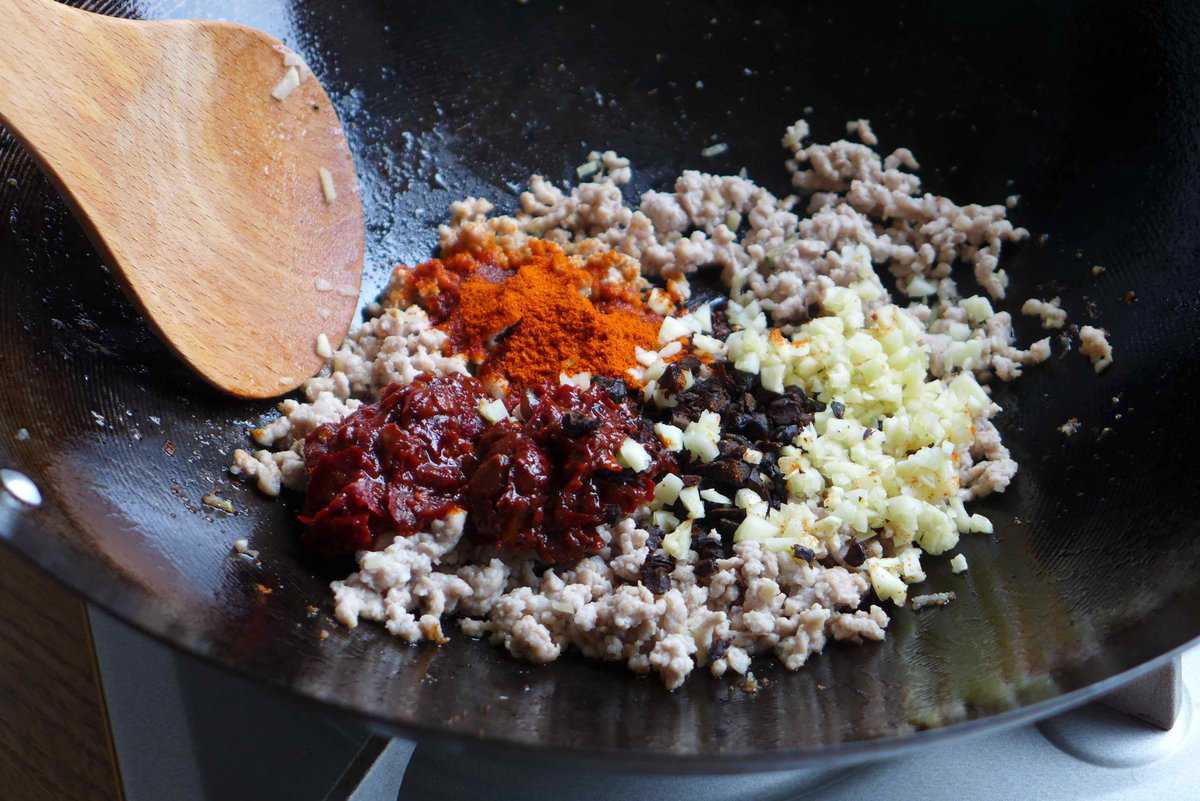 minced pork with chilli bean paste, black beans, chilli powder and garlic