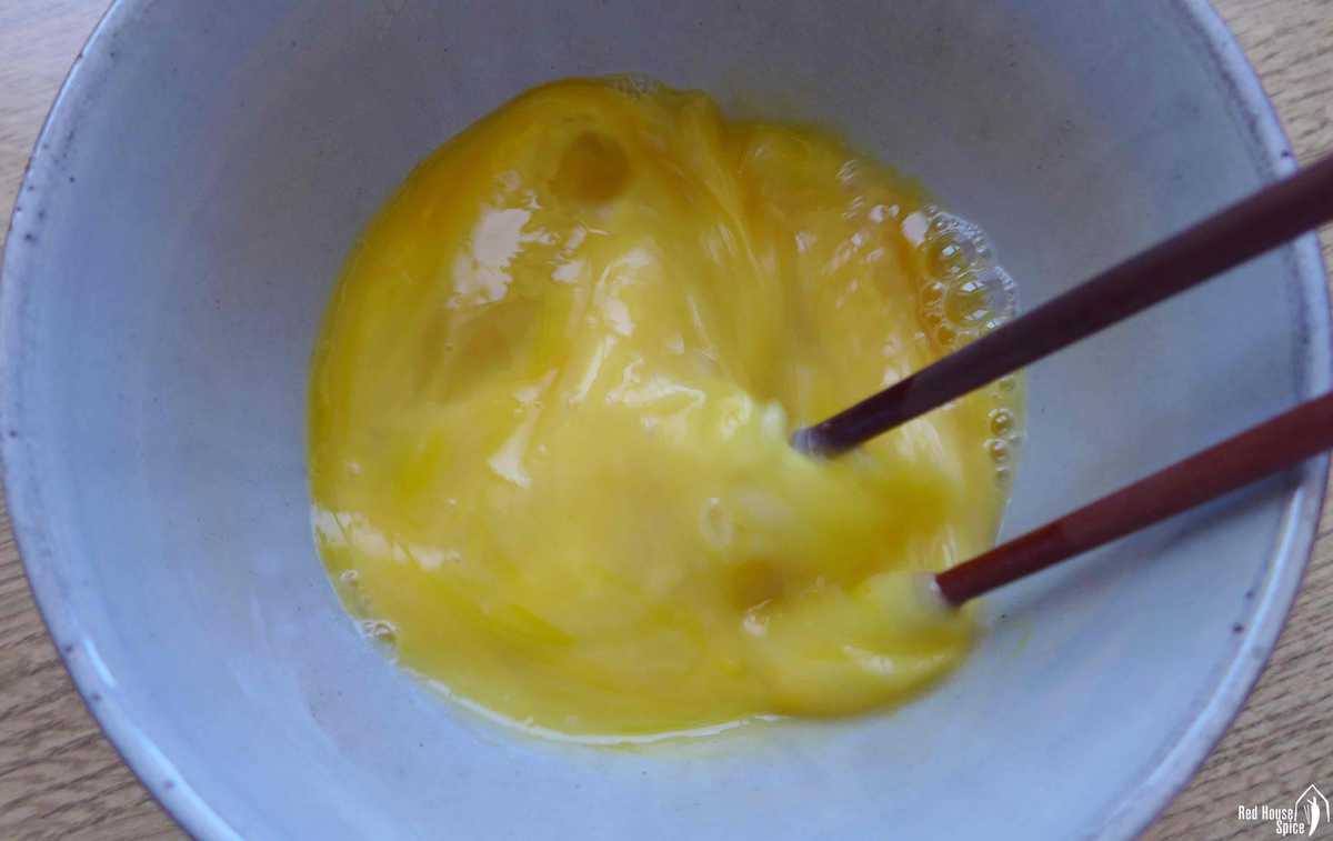 beat eggs with chopsticks
