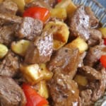 A plate of beef and mushroom stir-fry.