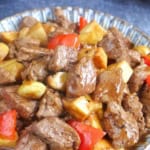 A plate of beef and mushroom stir-fry.
