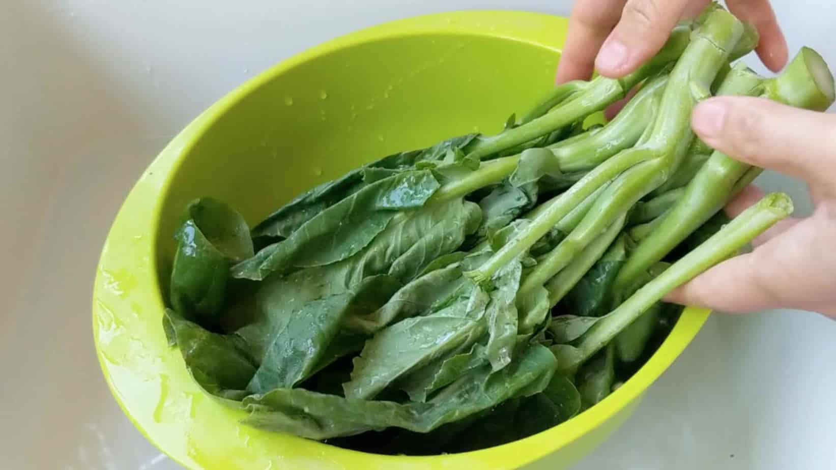 Chinese broccoli in a colander