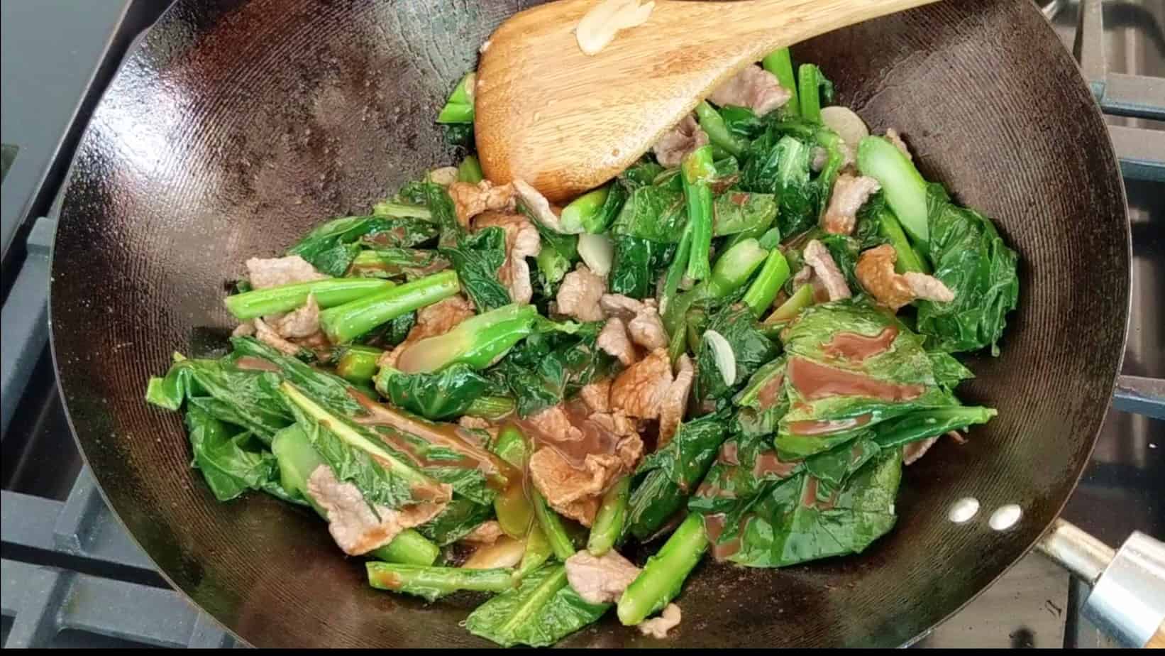 Beef & Chinese broccoli fried in a wok