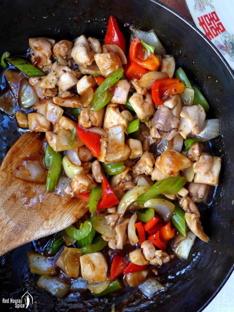 Black pepper chicken in a wok