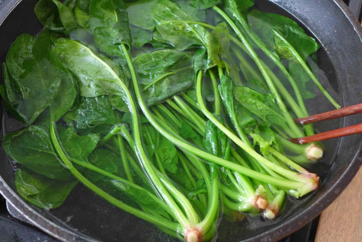 blanching spinach.
