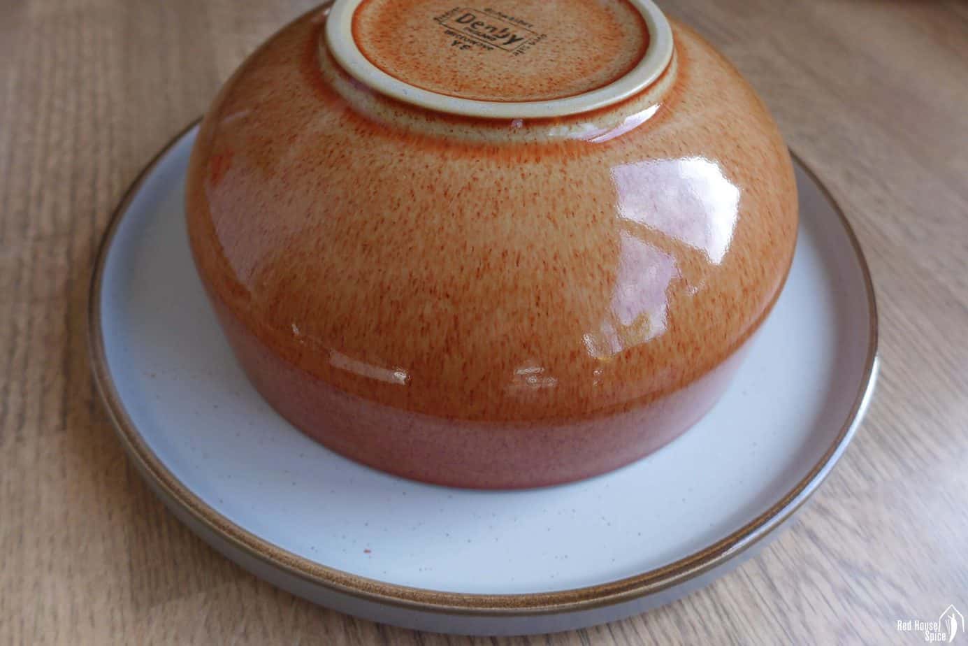 A bowl over a plate