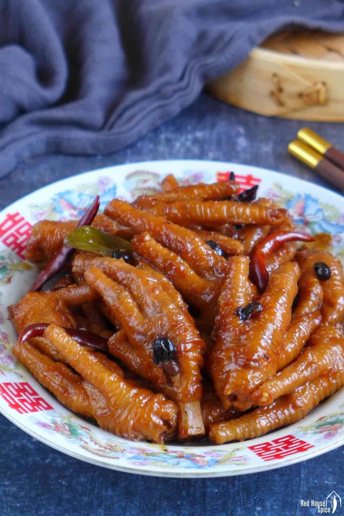 a plate of braised chicken feet
