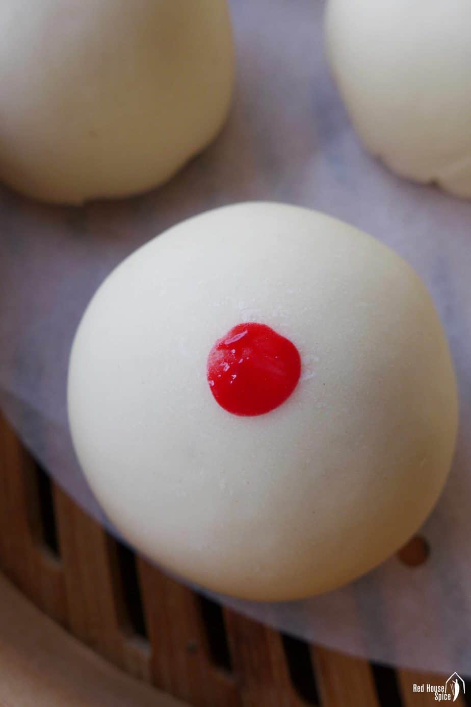 A bun with a red spot