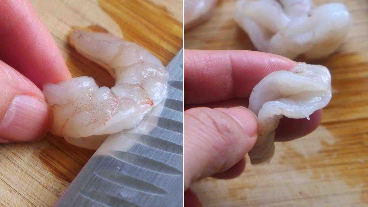 butterflying shrimp with knife.