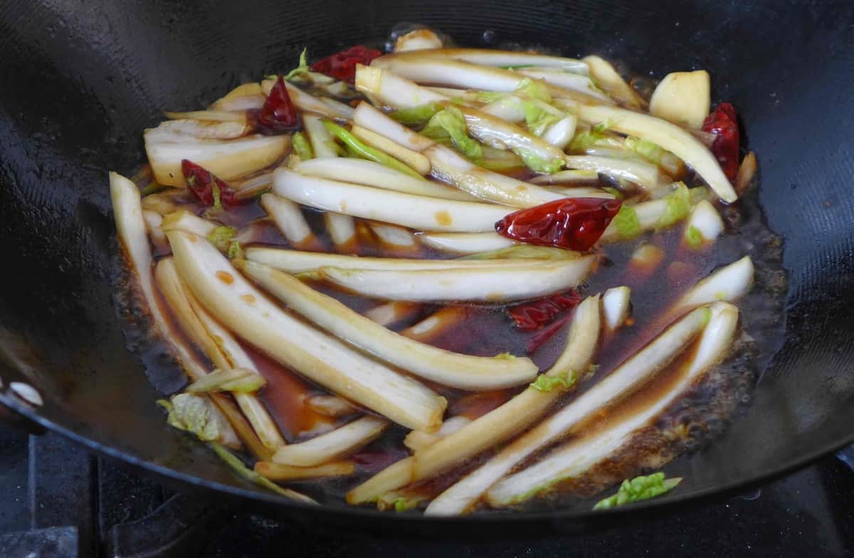 strips of Napa cabbage in cooking liquid