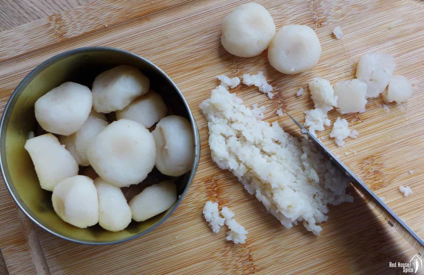 Canned water chestnut on a chopping board
