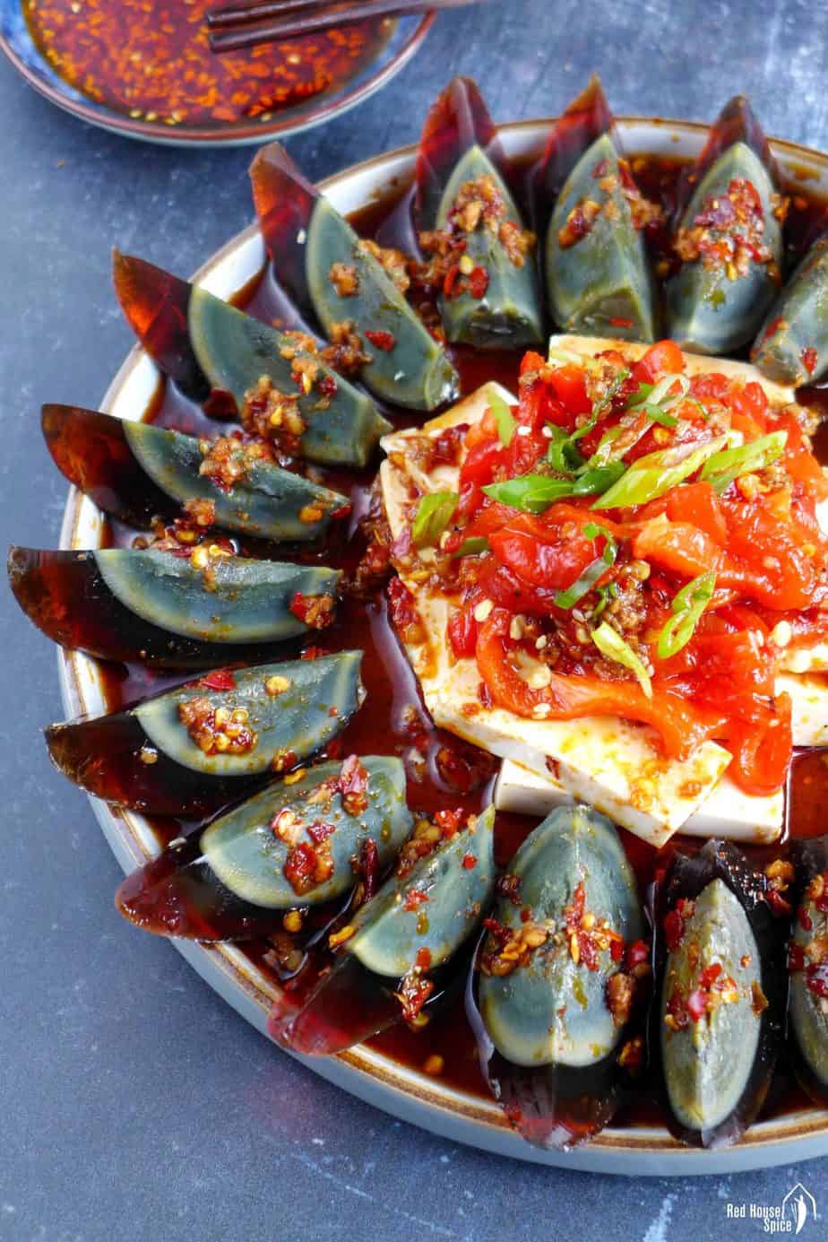 A plate of century egg and tofu salad