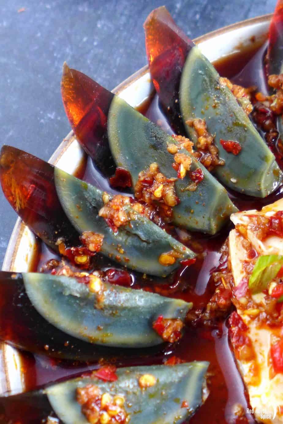 Century egg wedges in spicy dressing
