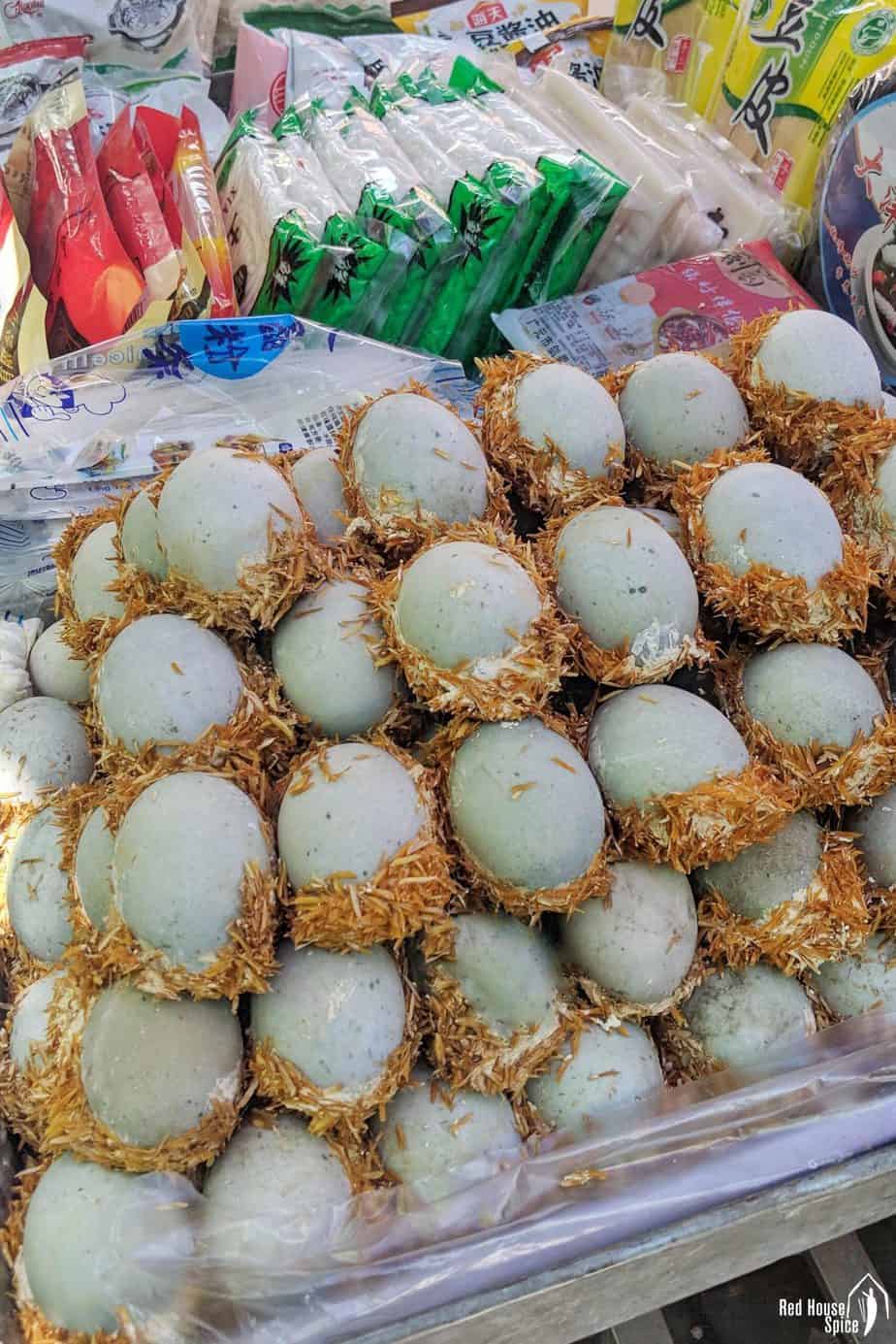 Century eggs sold in a market.