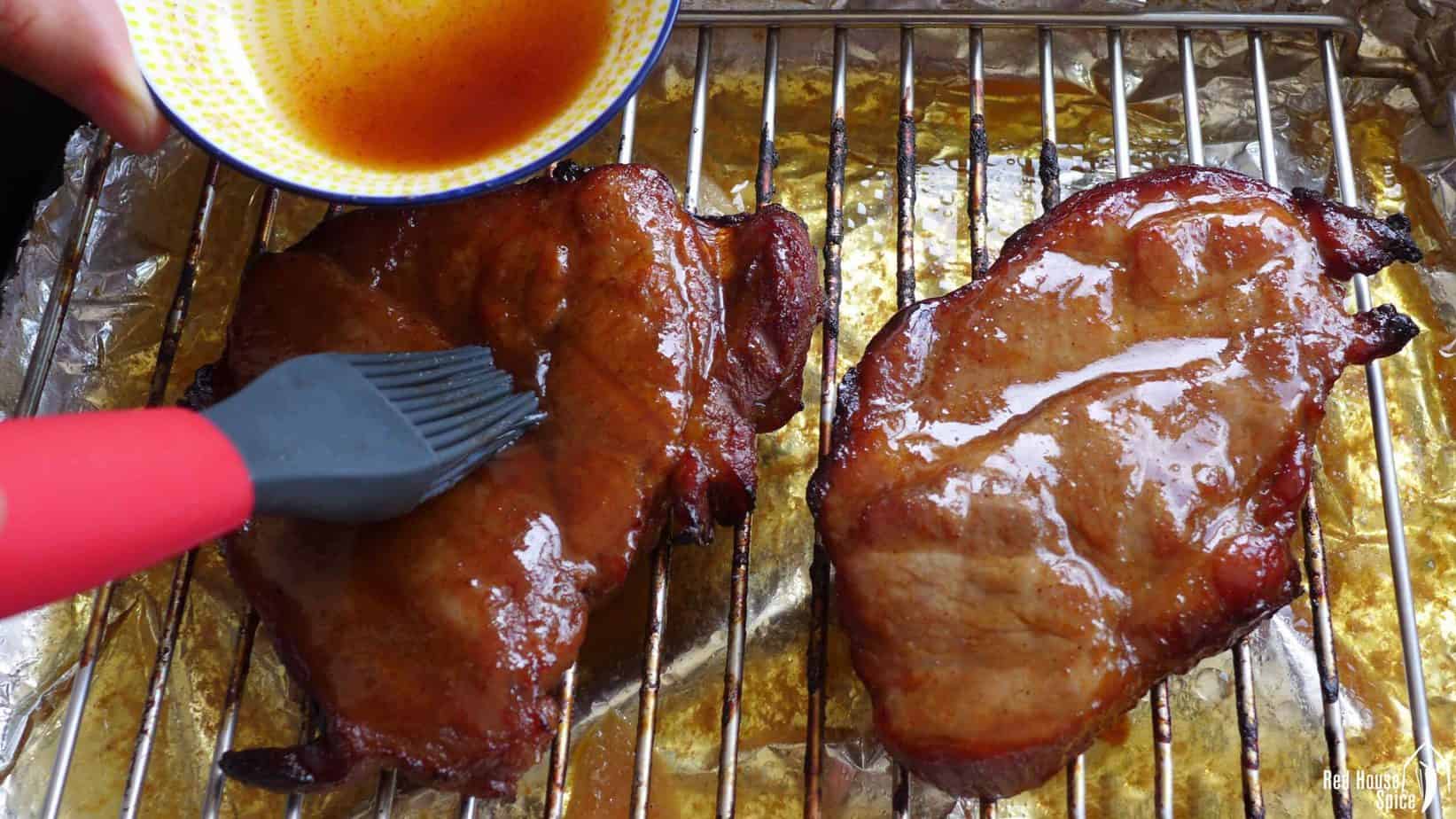 Brushing marinade on roasted Char Siu