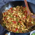 chicken fried rice in a wok.