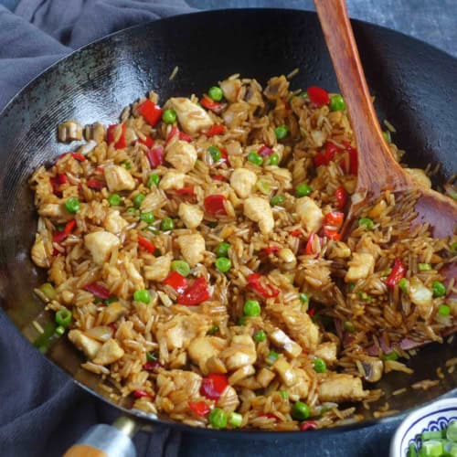 chicken fried rice in a wok.