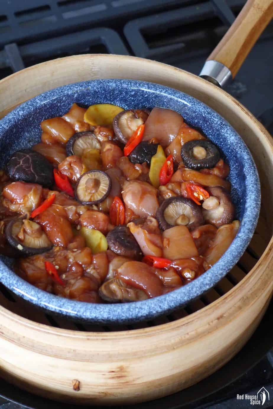 marinated chicken in a steamer