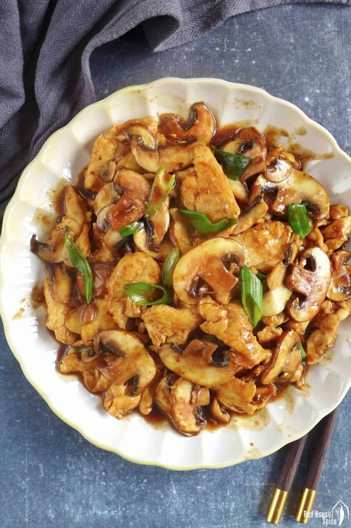 chicken and mushroom stir-fry on a plate.