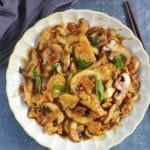 chicken and mushroom stir-fry on a plate.