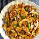 chicken and mushroom stir-fry on a plate.