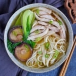 A bowl of chicken noodle soup.