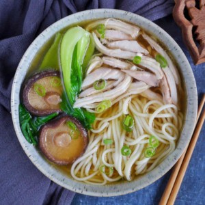 A bowl of chicken noodle soup.