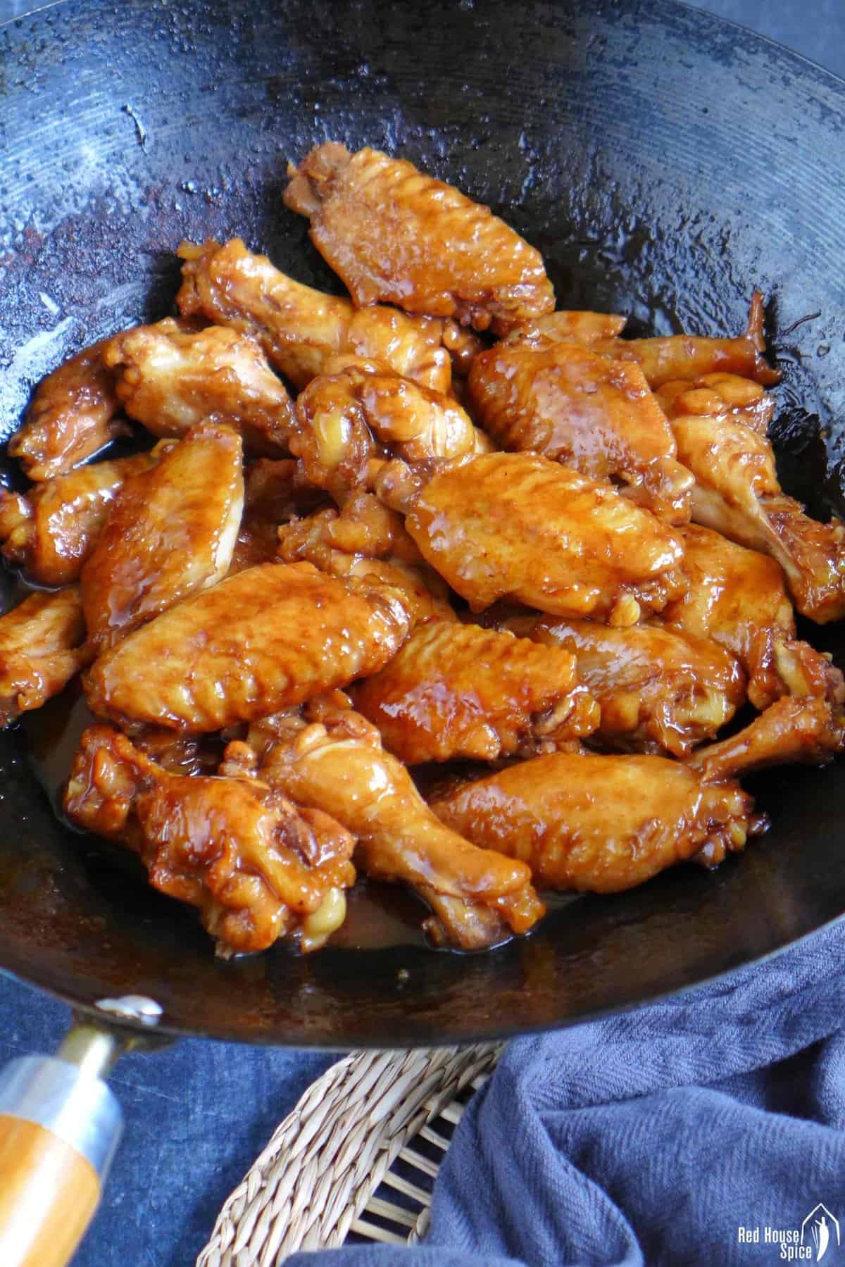 Coca Cola chicken wings in a wok