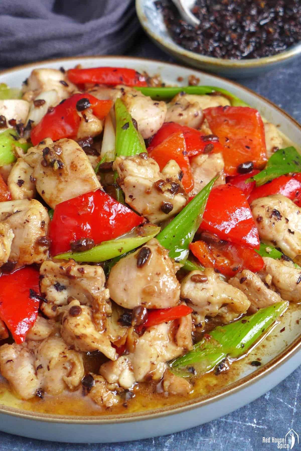 chicken stir-fried with black bean sauce.