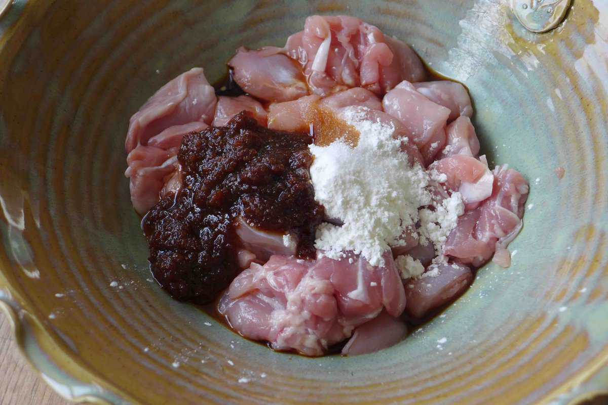 raw chicken with Sha Cha sauce and other seasonings.