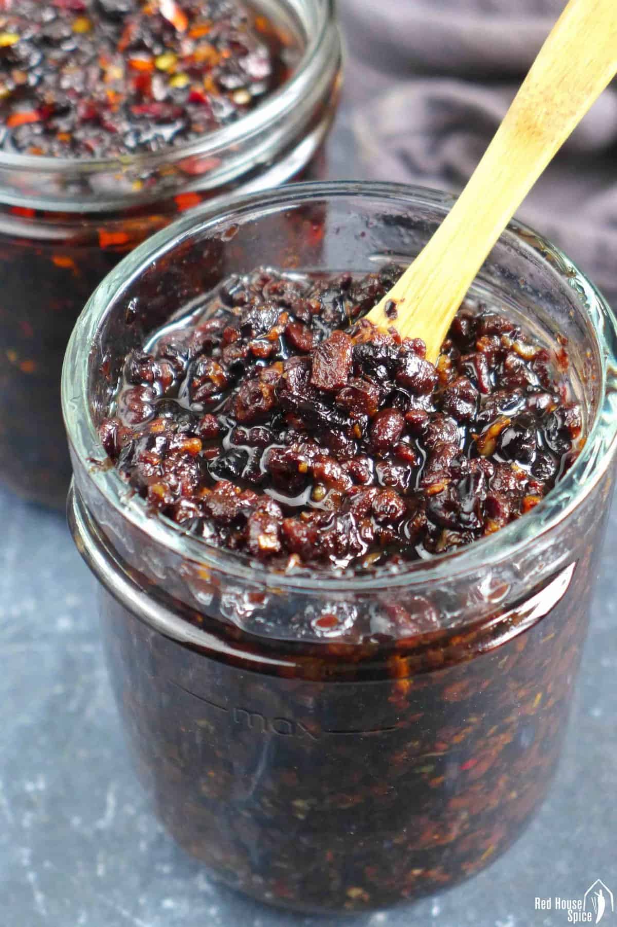 black bean sauce with a spoon.