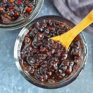 black bean sauce with a spoon.