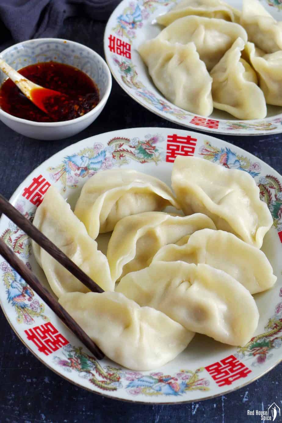 Chinese boiled pork dumplings and chili oil