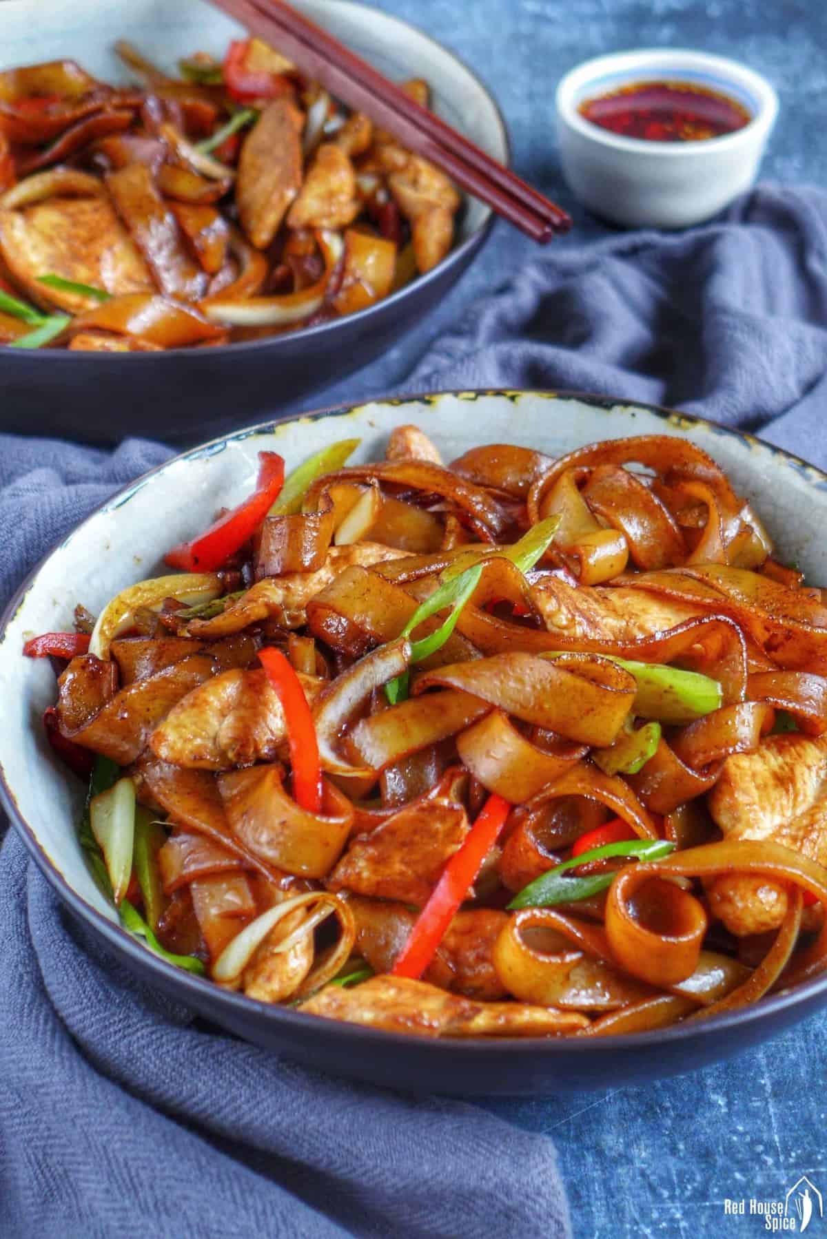 chicken chow fun in a bowl