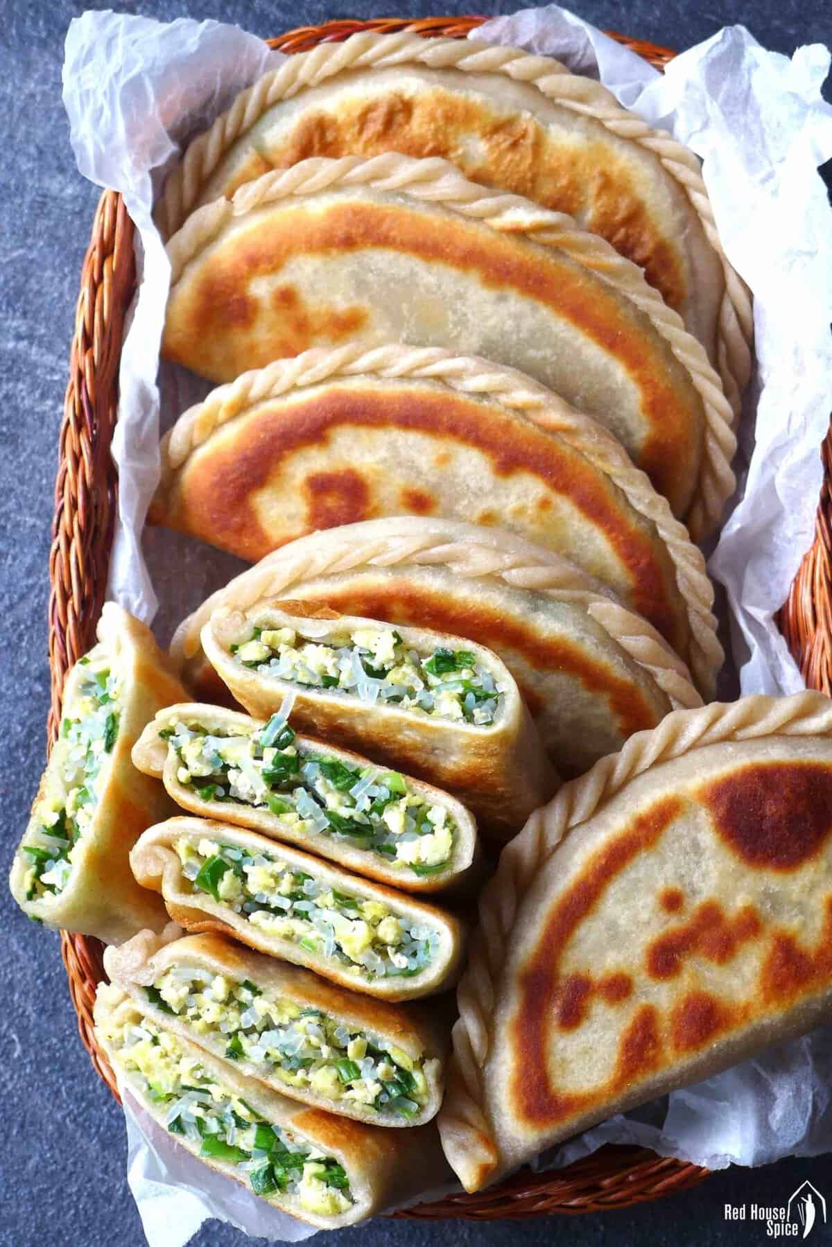 Chinese chive pockets with some cut in halves.