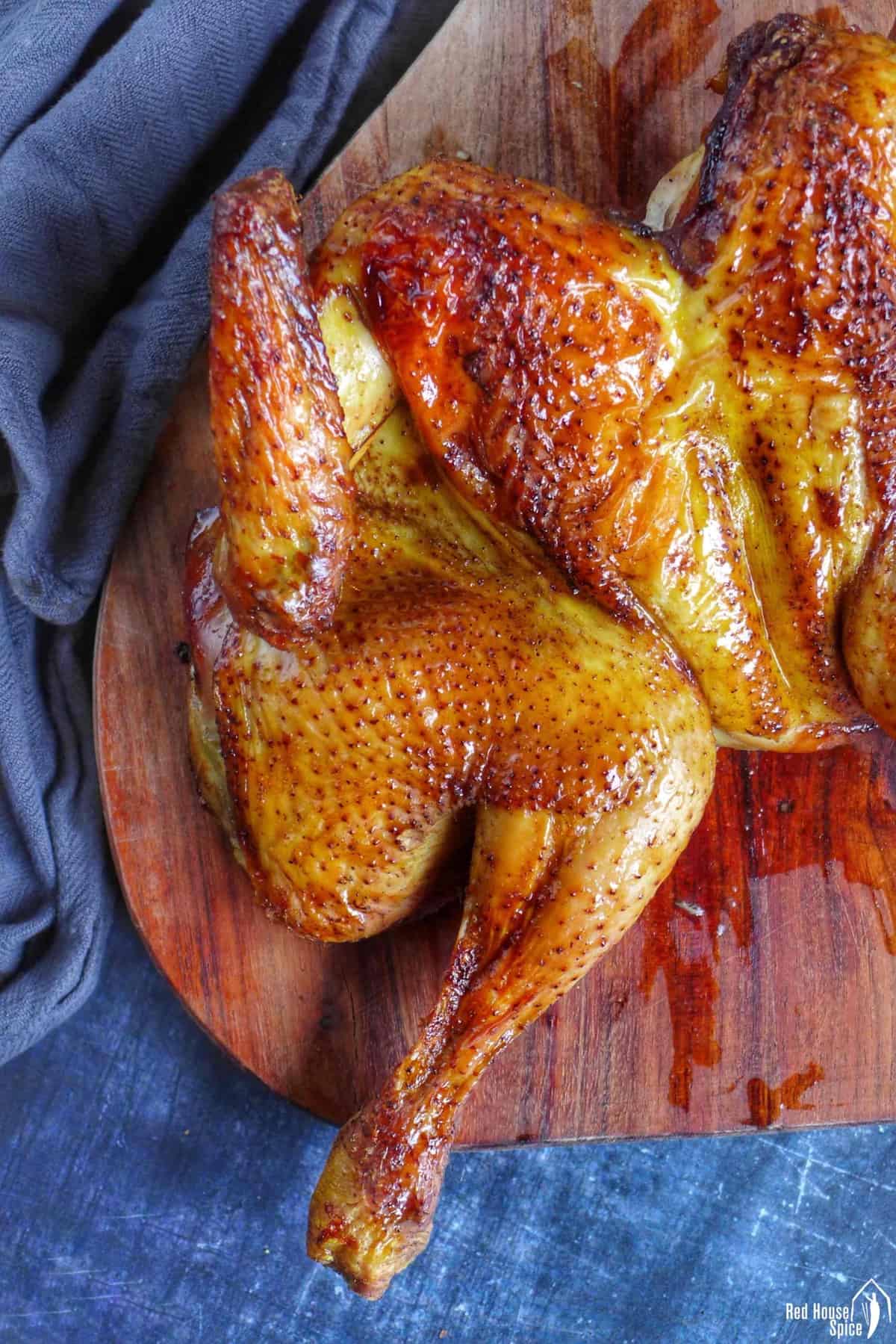 roast chicken on a chopping board