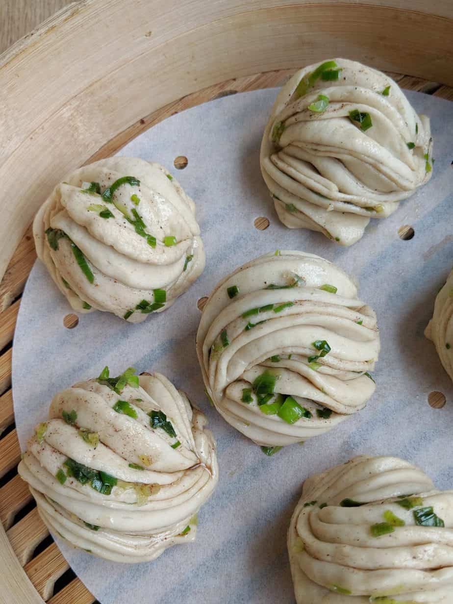 Chinese flower rolls in a steamer