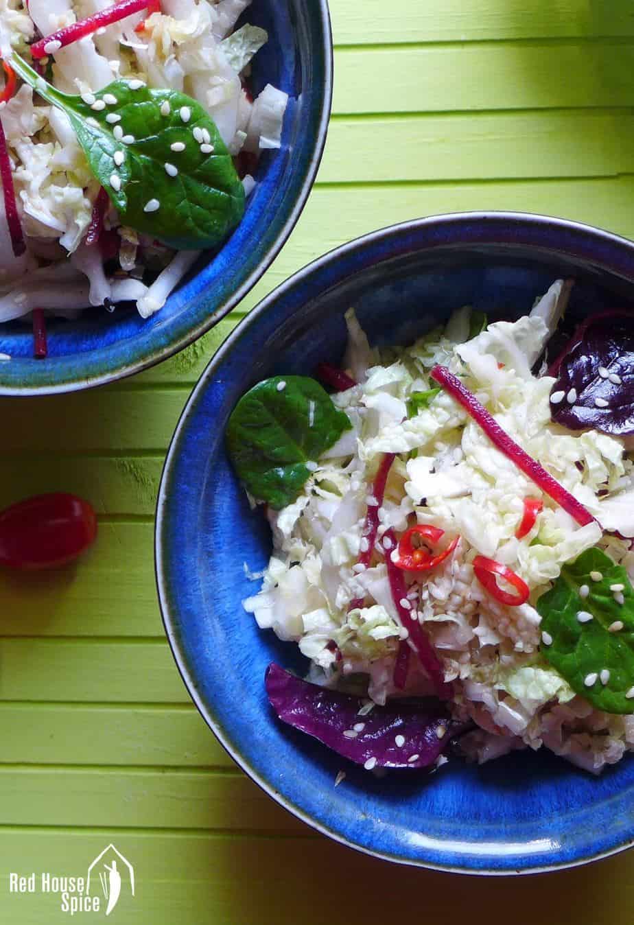 Napa cabbage salad in bowls