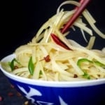 Stir-fried potato strips with chillies