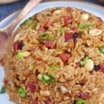Chinese sticky rice with sausage, mushroom and peanuts with overlay text that says Chinese sticky rice.