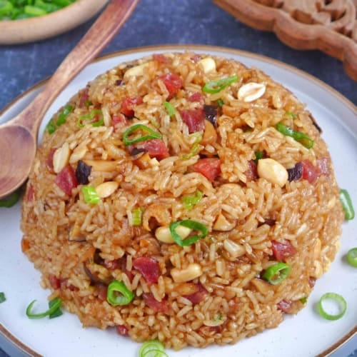 Chinese sticky rice with sausage, mushroom and peanuts.
