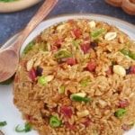 Chinese sticky rice with sausage, mushroom and peanuts.