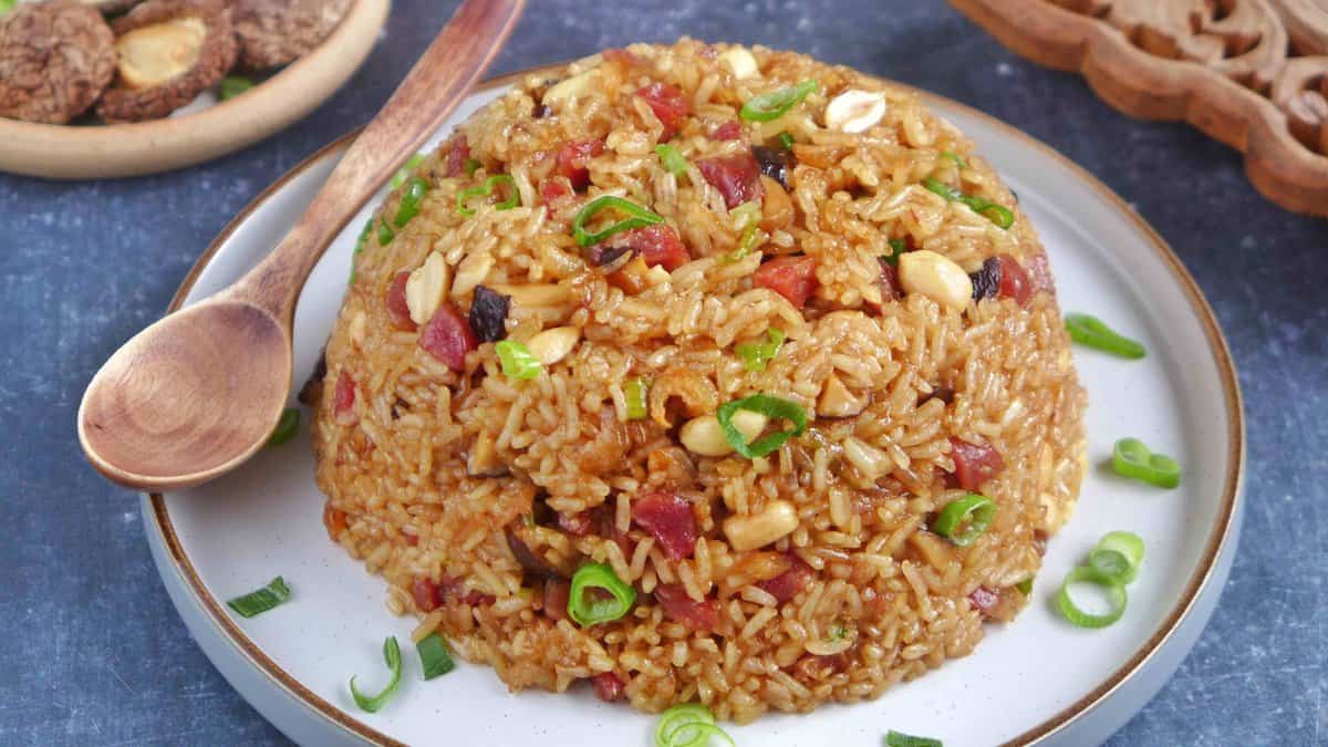 Chinese sticky rice with sausage, mushroom and peanuts.