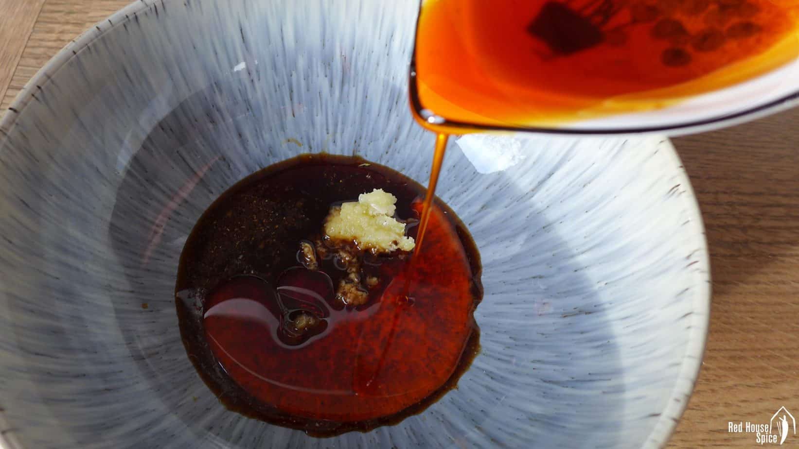 Chinese chilli oil added to the seasoning for Chongqing noodles.