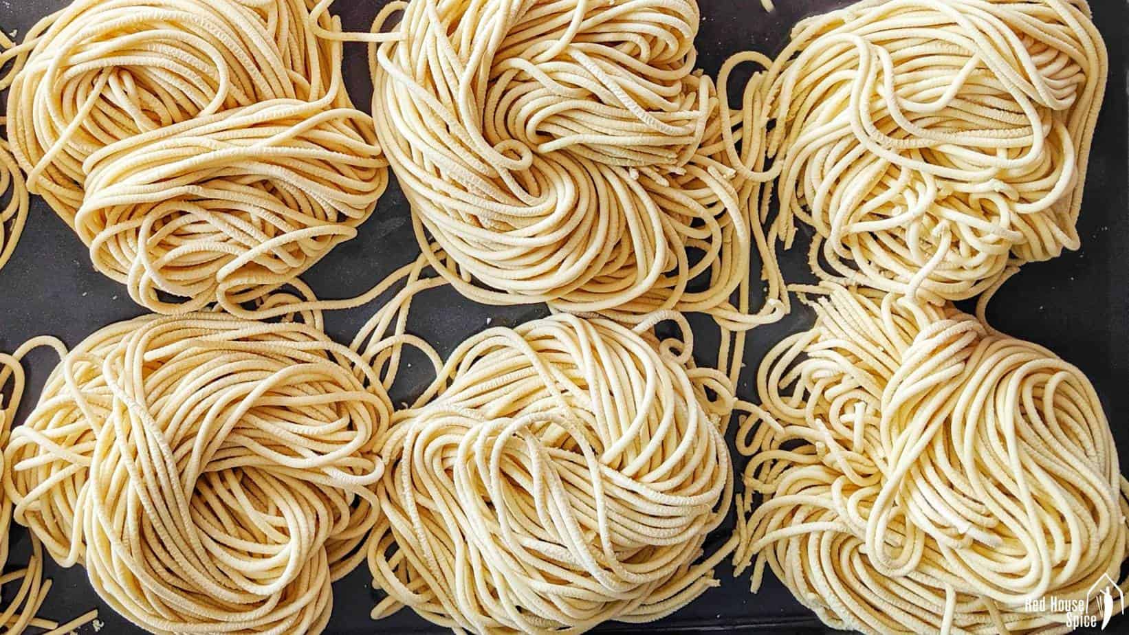 Six rolls of fresh alkaline noodles.
