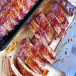 Chinese BBQ ribs on a chopping board with overlay text that says Chinese BBQ ribs.