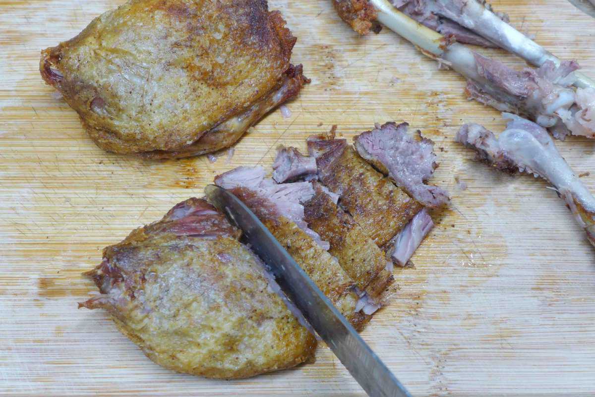 cutting duck legs.
