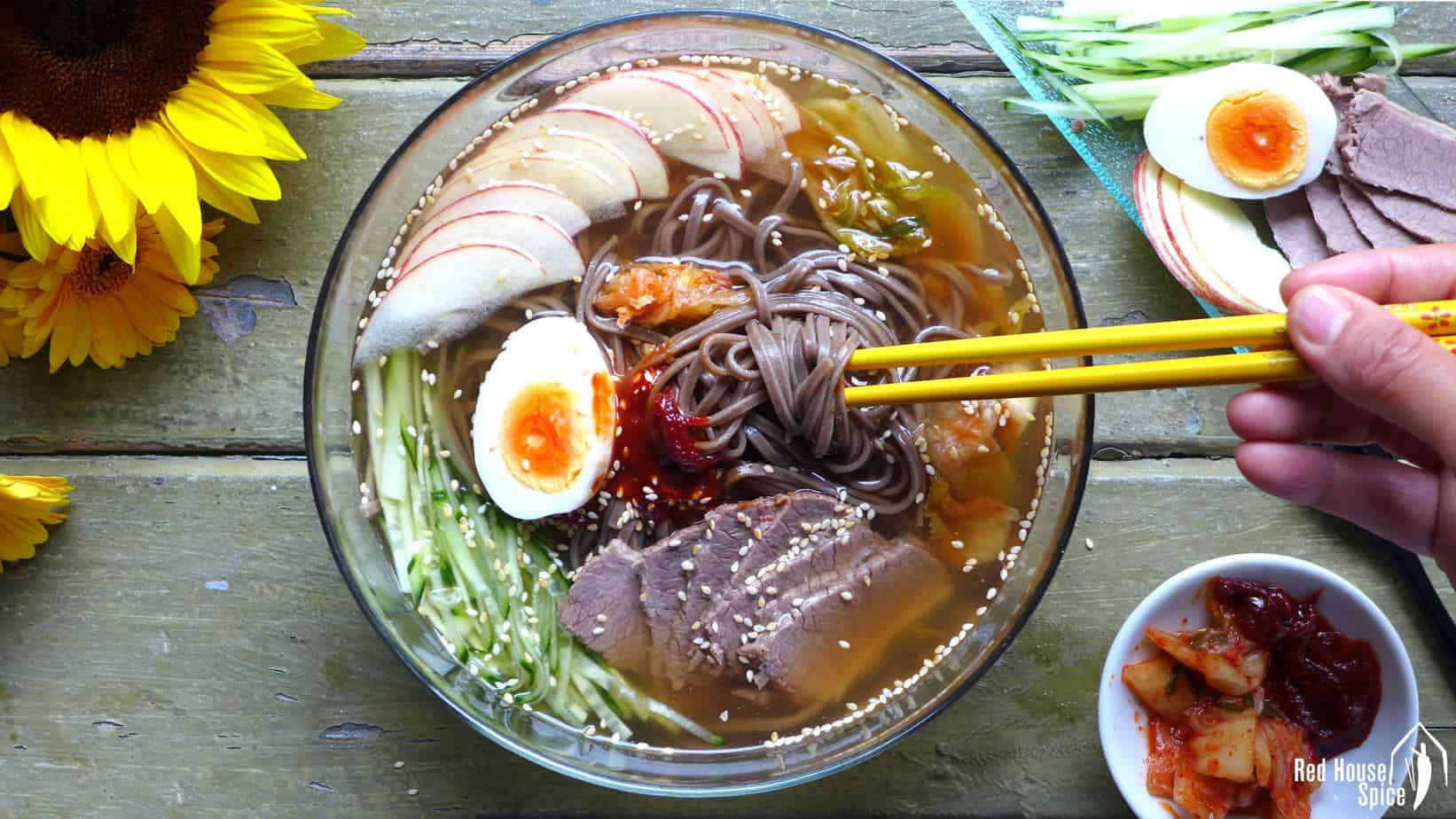 Slippery noodles in ice cold soup, served with various healthy toppings, cold soba noodles in beef broth is a perfect dish to cool you down in hot weather.