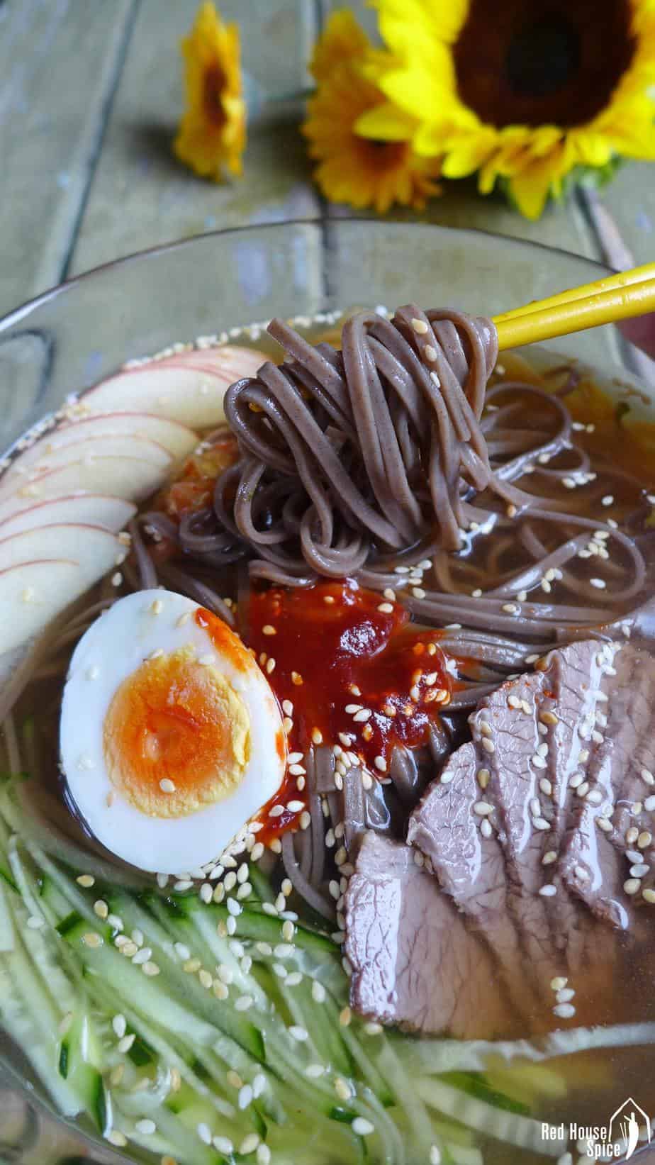 Slippery noodles in ice cold soup, served with various healthy toppings, cold soba noodles in beef broth is a perfect dish to cool you down in hot weather.