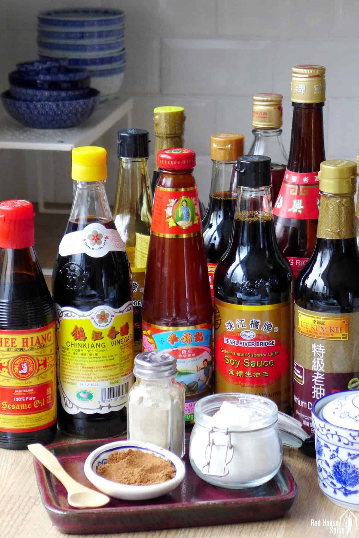 Bottles of sauces and powdery ingredients